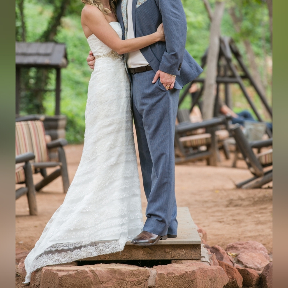 Size 4 ivory strapless lace wedding gown